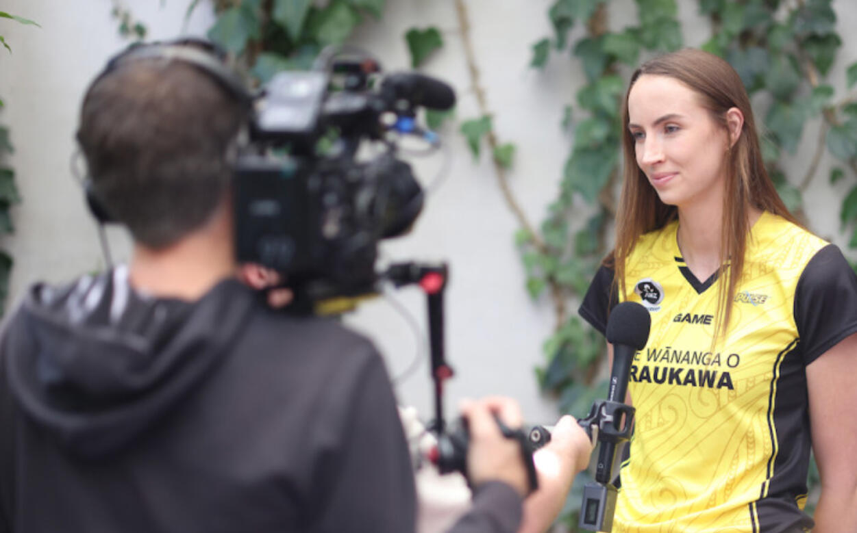 Dave Weston filming an interview with Pulse Netball player Kelly Jackson using a Sony FX6 camera.